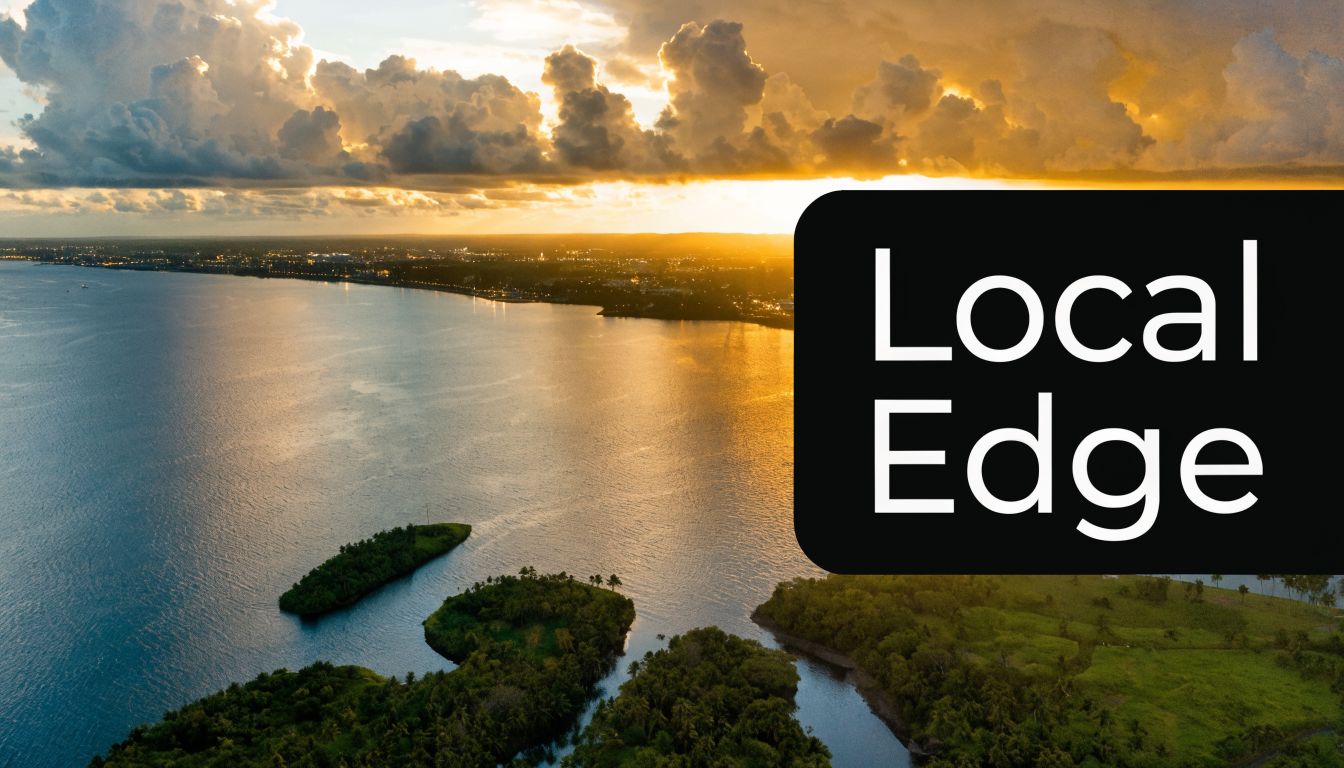 A serene tropical coastline during a golden sunset with lush islands and reflections on the calm water.