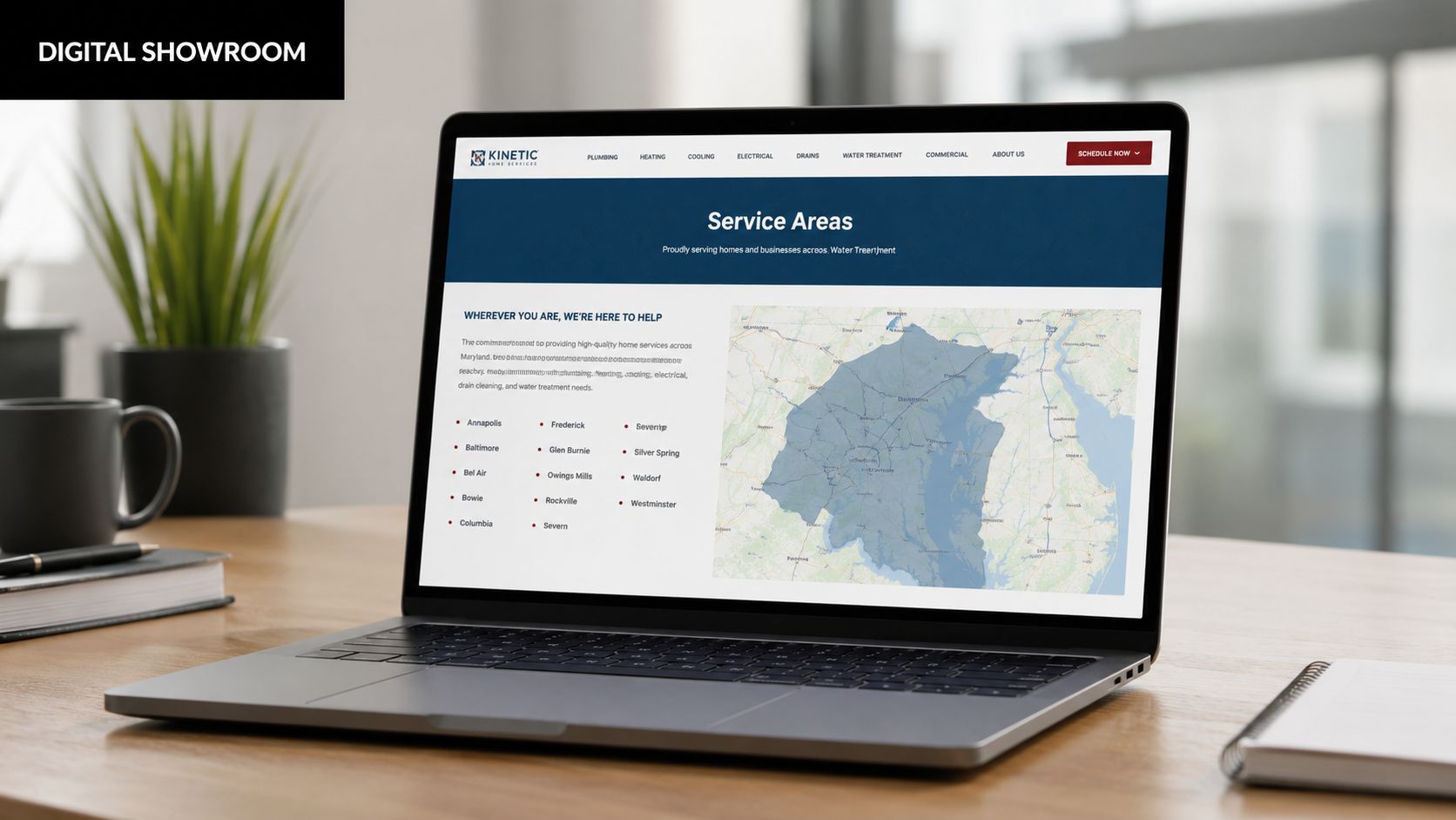 A laptop on a wooden desk displaying a Kinetic Home Services webpage showing local service areas map.